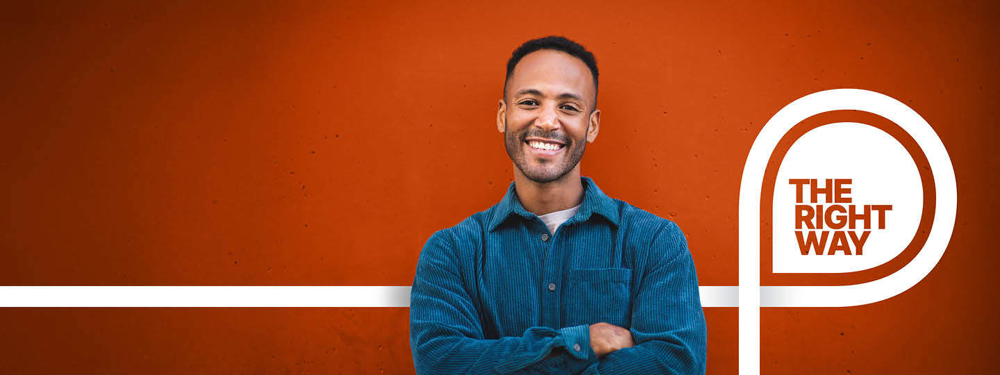 TS_RM_2025_Man_On_Dark_Orange_Wall_Web_Banner_Horiz_1440x540